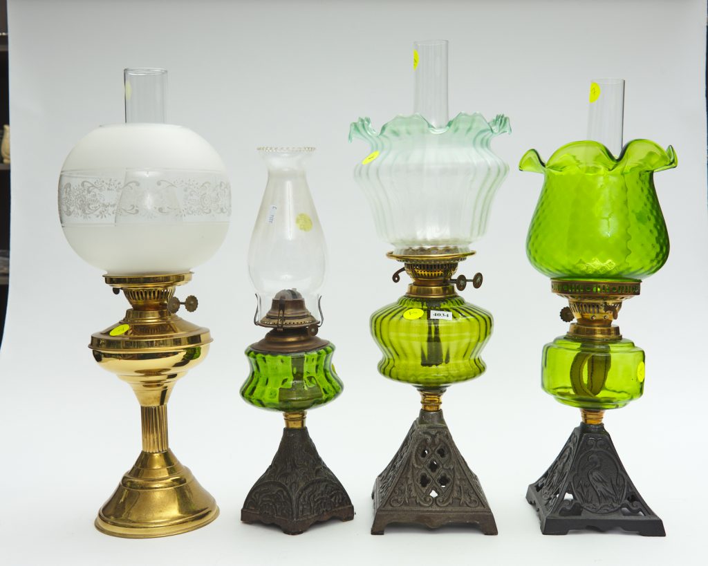 4 kerosene lamps from downsizing and deceased estates available at auction